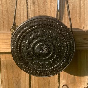 Black crossbody circle bag